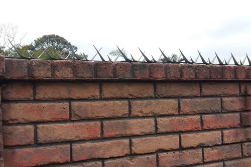 Wall Spikes on Brick Wall